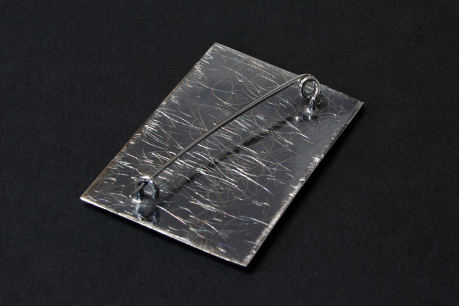 Xevi Domene lapel needle