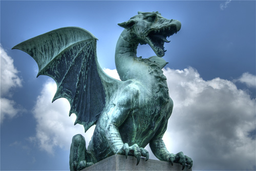 The famous green dragon on the Dragon Bridge in Ljubljana .